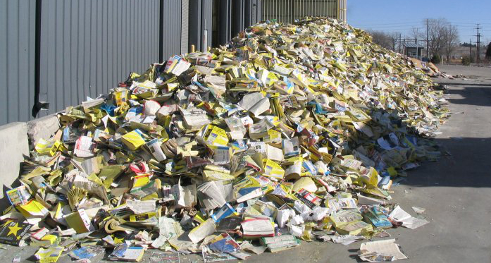 A pile of discarded phonebooks